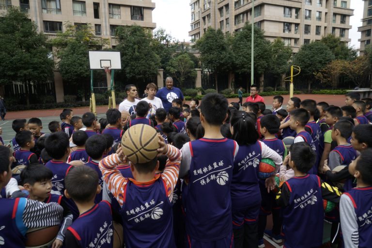Coach Dip and Coach Tim developing young players in Kunming, China.