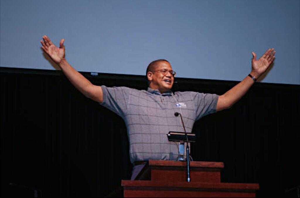 Robert 'Dip" Donaldson gives a speech after receiving the distinguished alumni award at his alma mater, Northwest Nazarene University